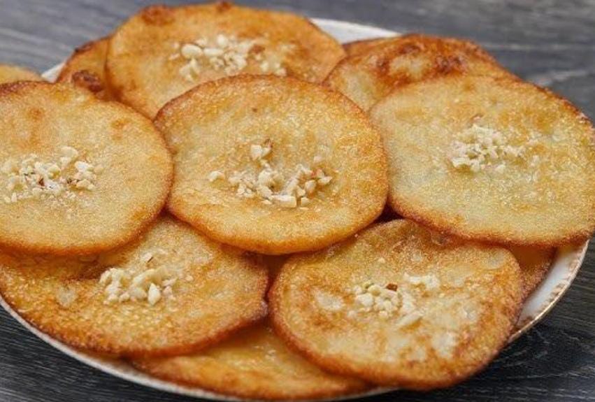 পুজোর ছুটিতে মিষ্টিমুখ আবশ্যক , বানিয়ে ফেলুন দইয়ের মালপোয়া